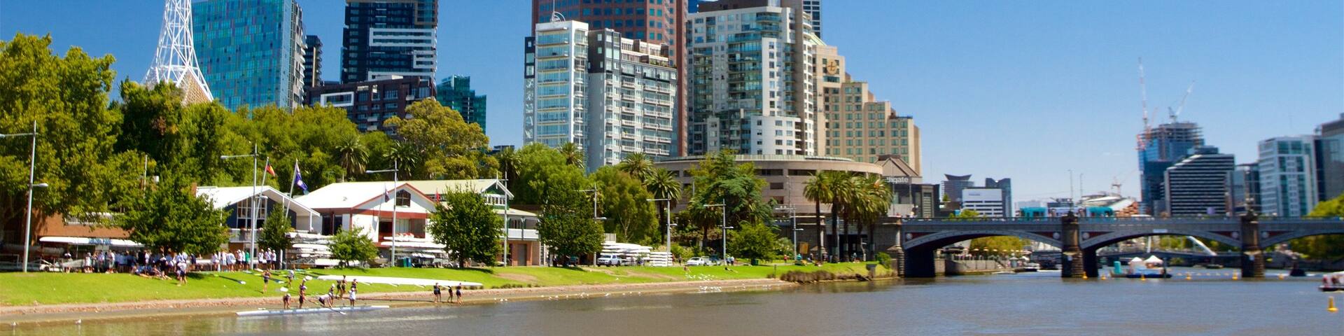 Birrarung Marr Park which includes a skyscraper, a river or creek and a city