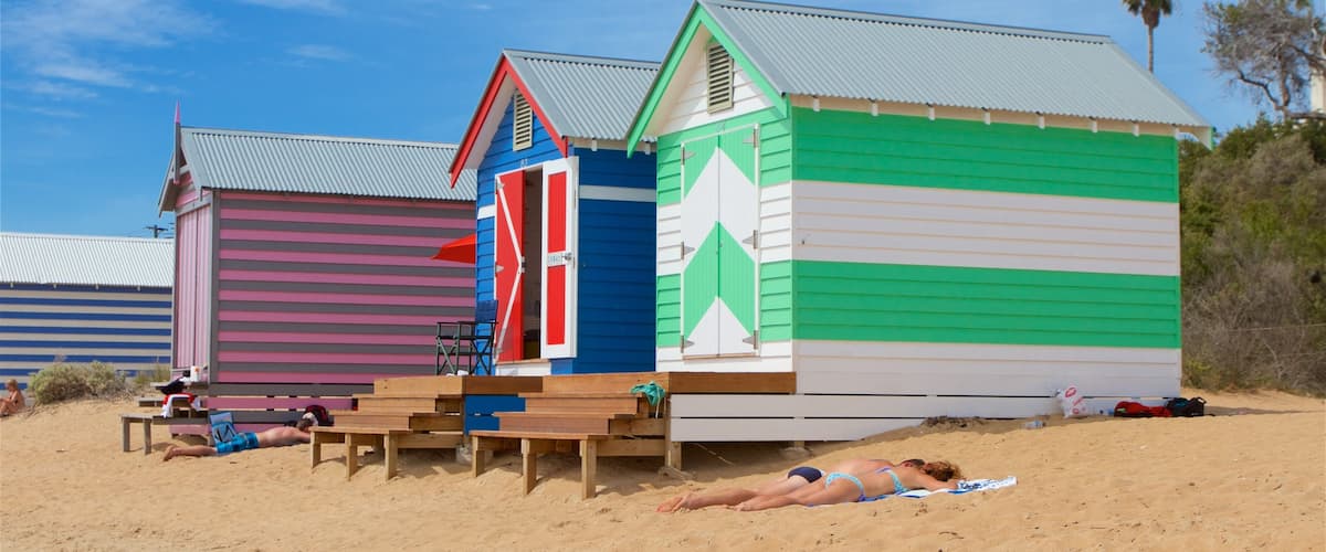 Brighton featuring a sandy beach and general coastal views as well as a couple