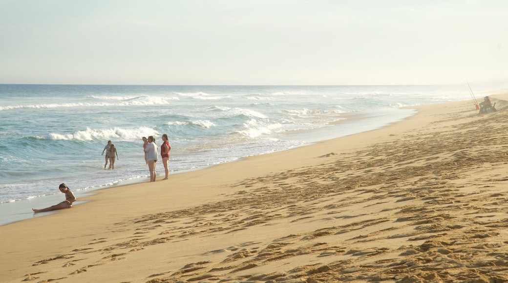 Gippsland featuring a beach, waves and a bay or harbour