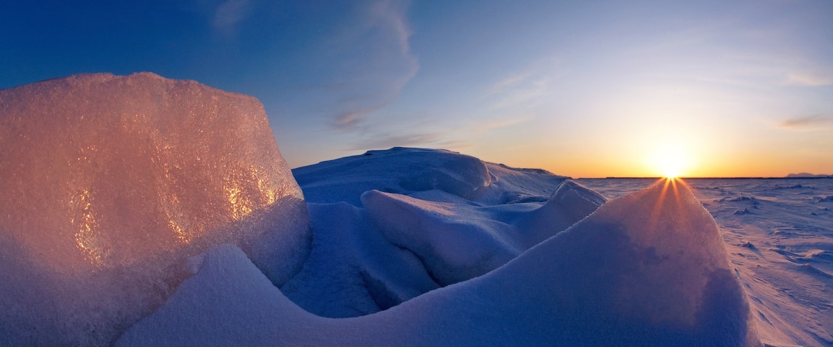 Nome featuring a sunset and snow