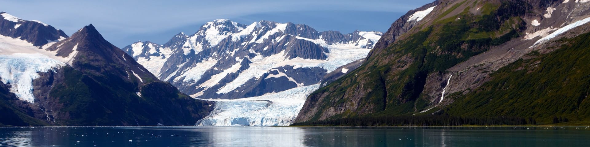 Kenai Peninsula which includes a bay or harbor and mountains