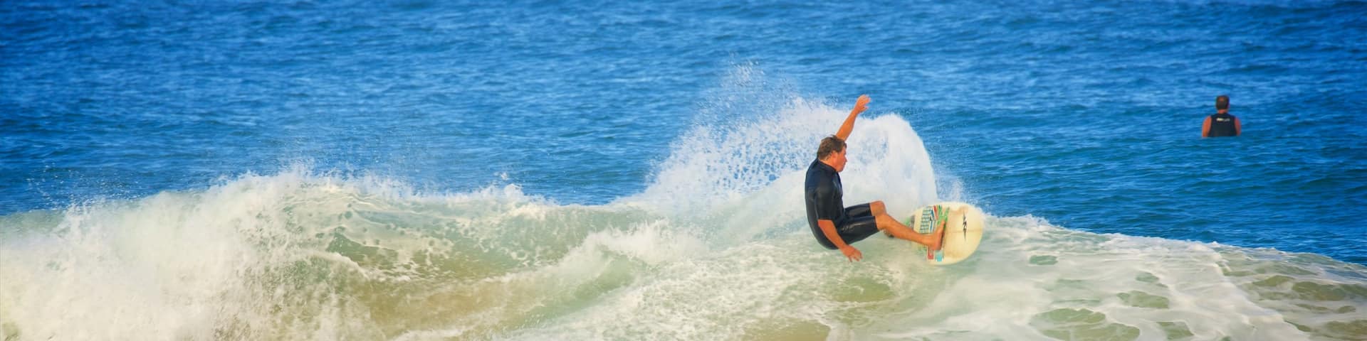 Avoca Beach which includes a bay or harbour, surfing and waves