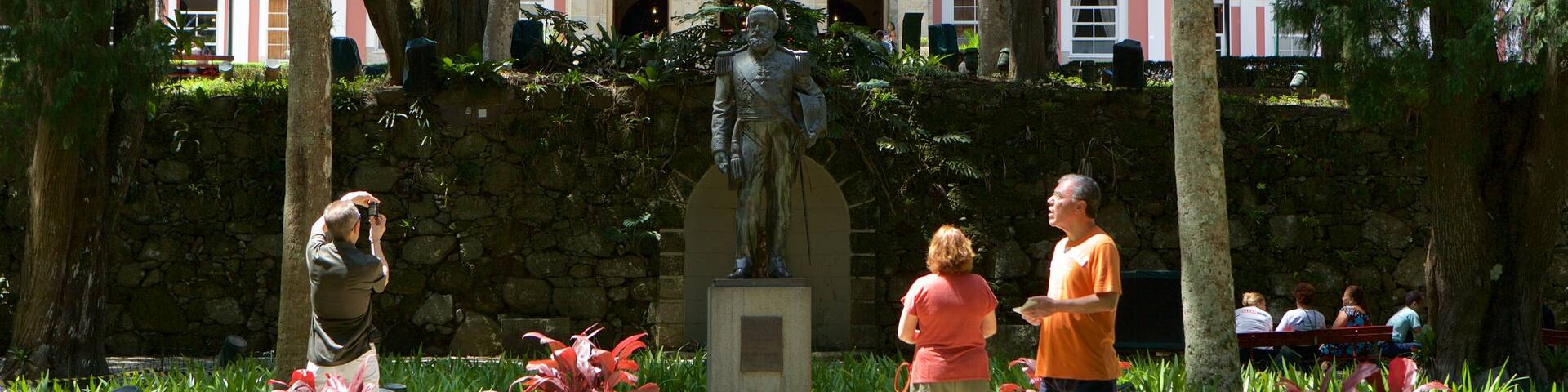 Historic Center which includes a park and a statue or sculpture as well as a couple