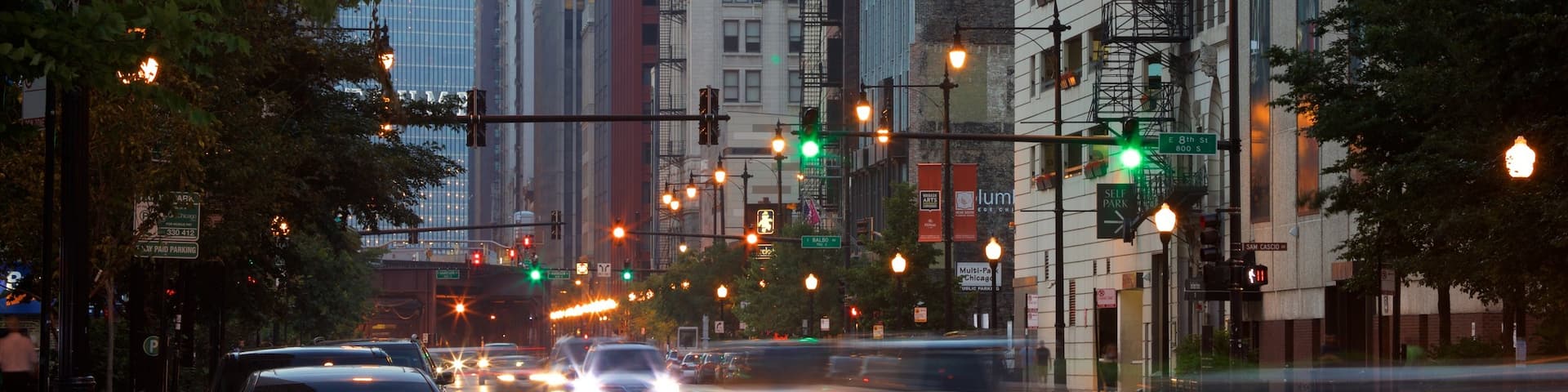 Lincoln Highway showing night scenes and a city