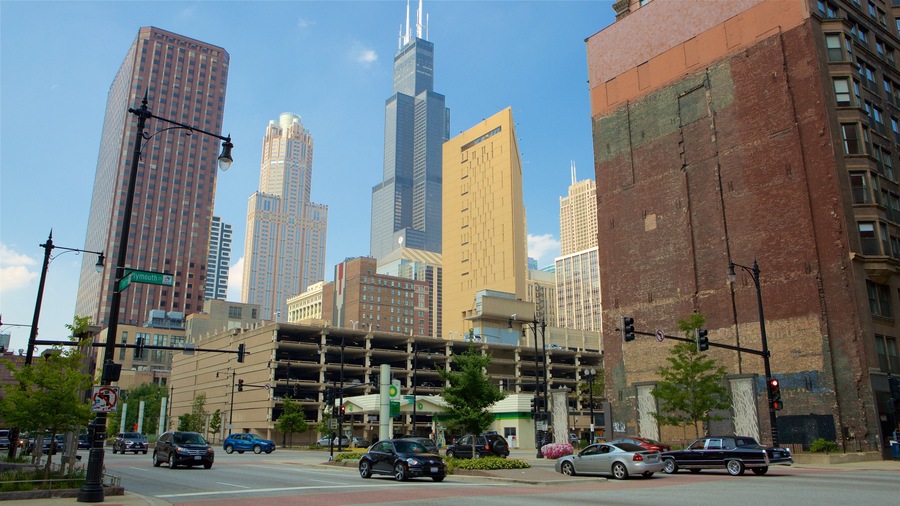 Printer\'s Row which includes street scenes, a city and a high-rise building