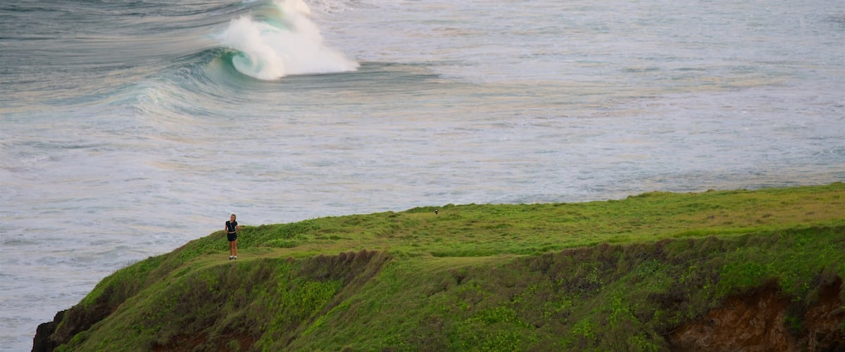 Lennox Head which includes a bay or harbour, surf and rocky coastline