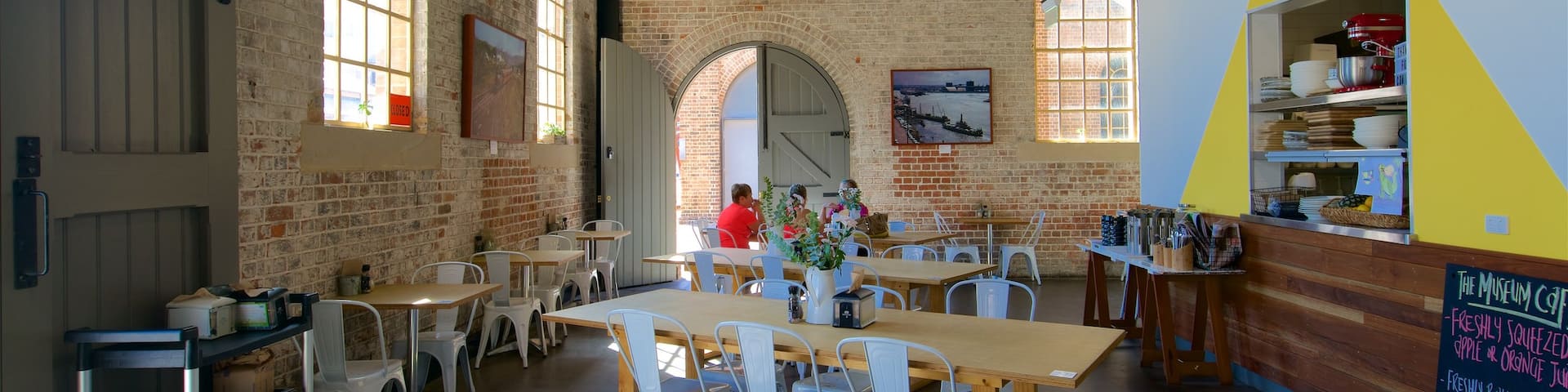 Newcastle which includes café lifestyle and interior views