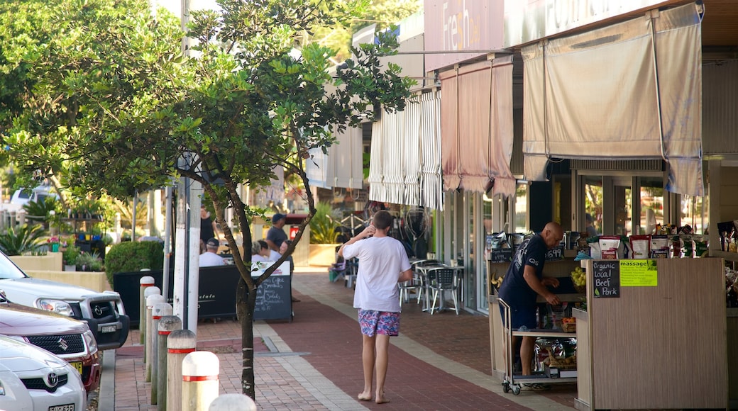 Yamba showing street scenes as well as an individual male