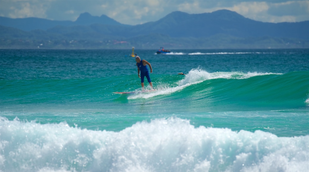 Wategos Beach featuring a beach and surfing