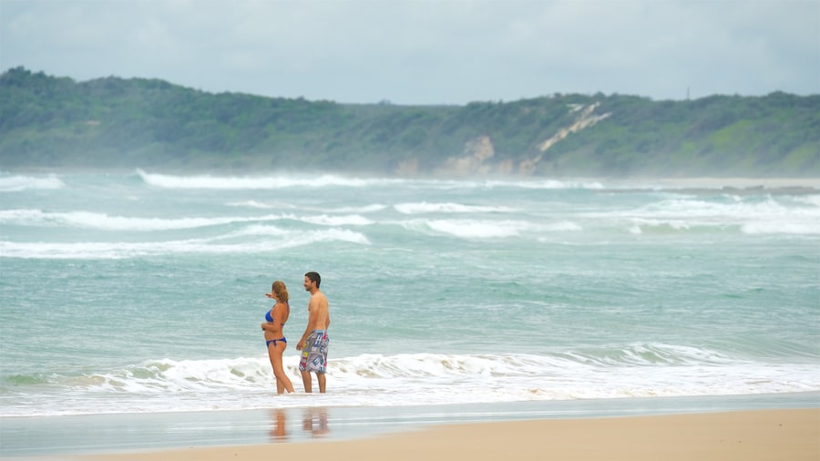 Pippi Beach featuring a sandy beach as well as a couple