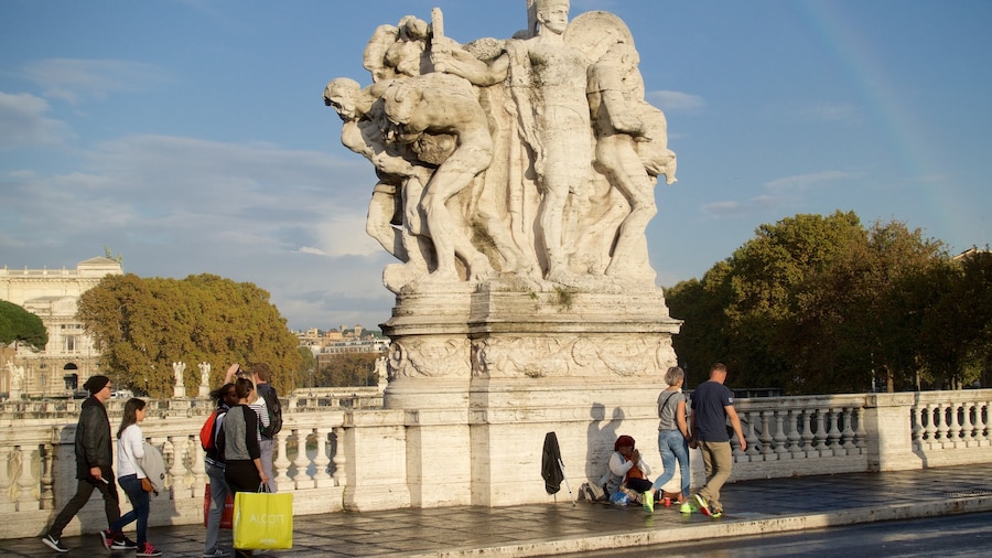 Rome showing a bridge as well as a small group of people