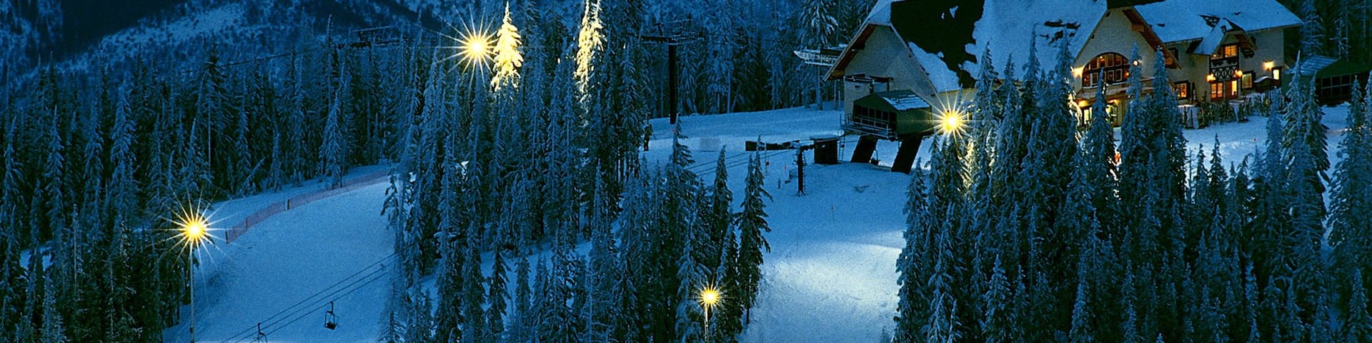 Kellogg featuring night scenes, snow and a gondola