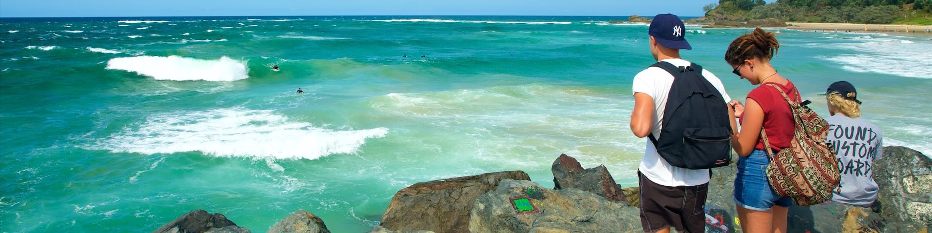 Port Macquarie showing rocky coastline, outdoor art and a bay or harbor