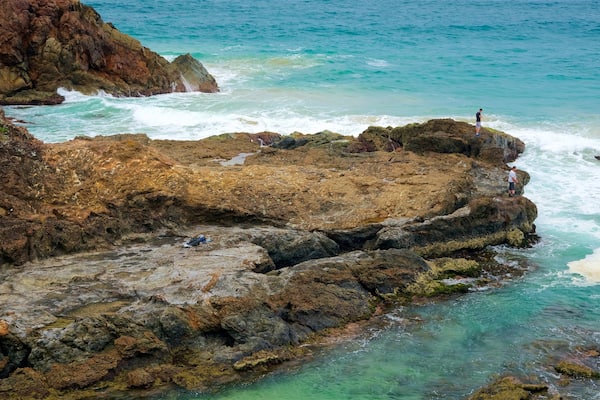 Port Macquarie featuring a bay or harbour and rugged coastline