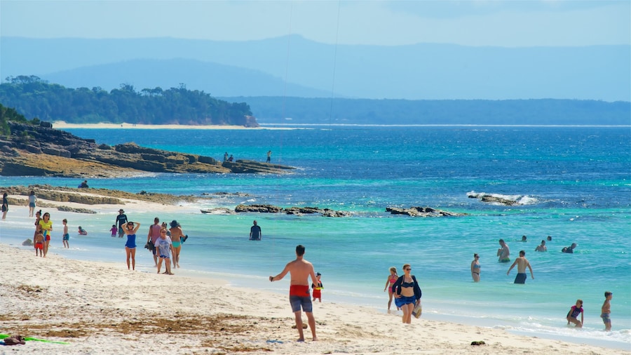 Jervis Bay National Park which includes rocky coastline and a beach as well as a large group of people
