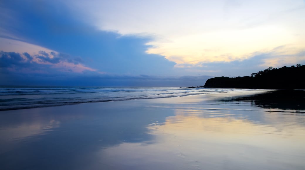 Pebbly Beach showing a sunset, general coastal views and a sandy beach