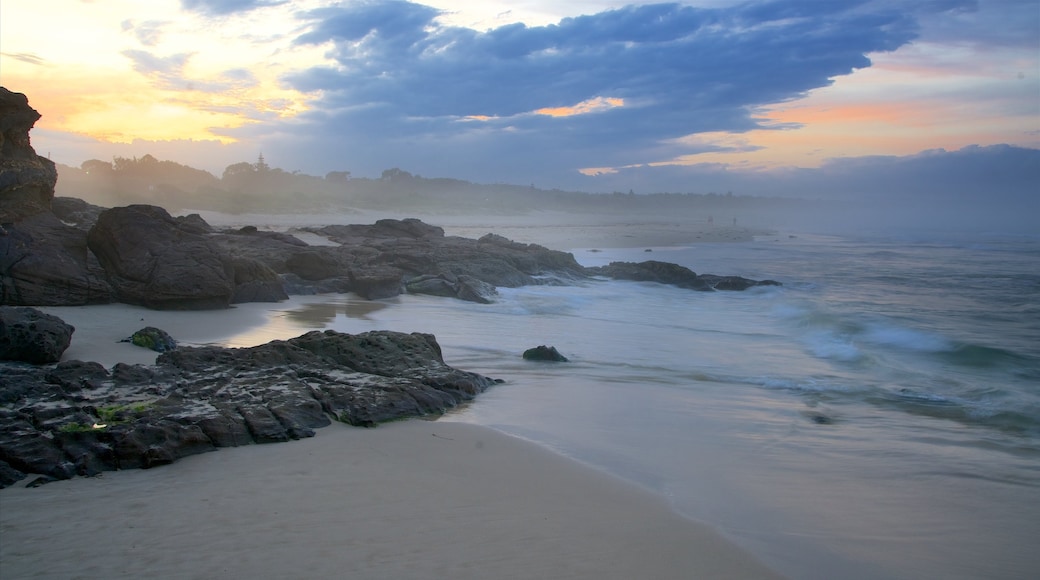 Pambula Beach featuring a sunset and a beach