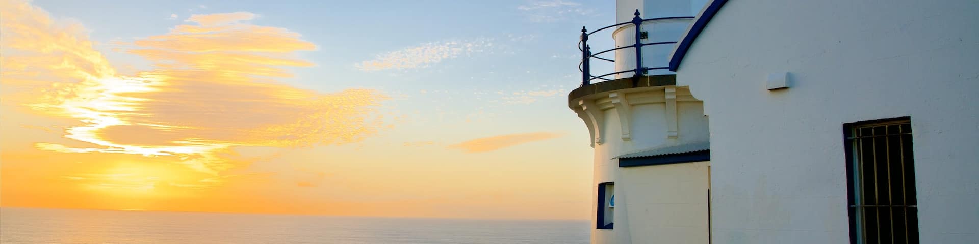 Port Macquarie showing a sunset and a lighthouse