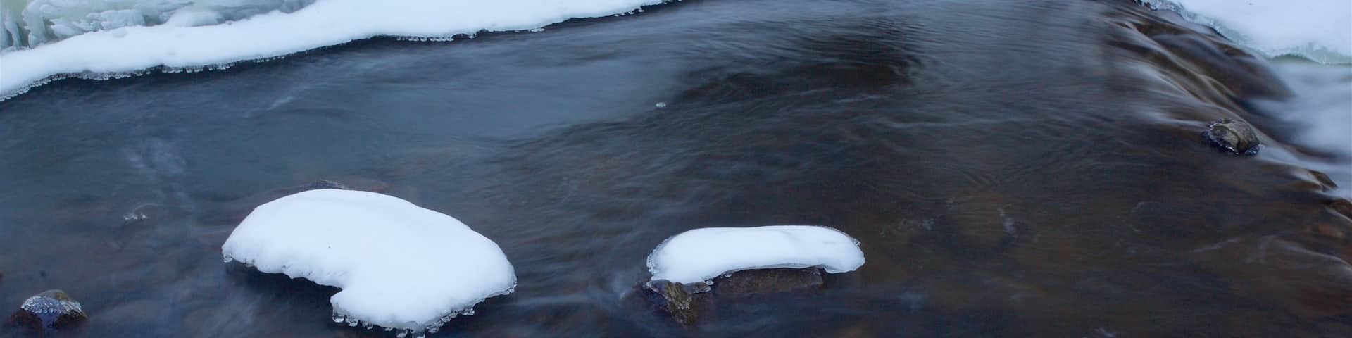 Outaouais featuring a river or creek and snow