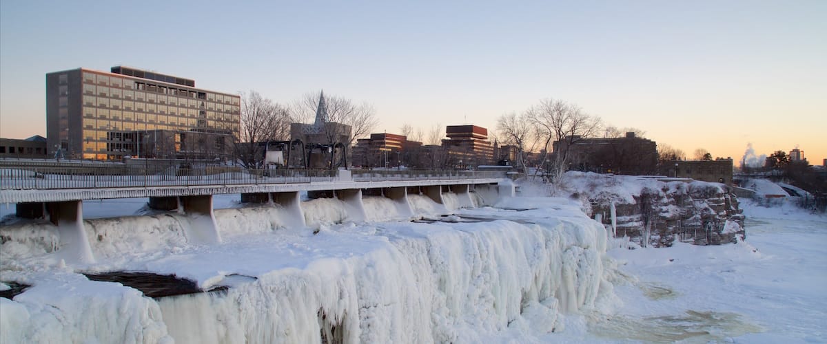 Ottawa featuring a bridge, snow and a cascade