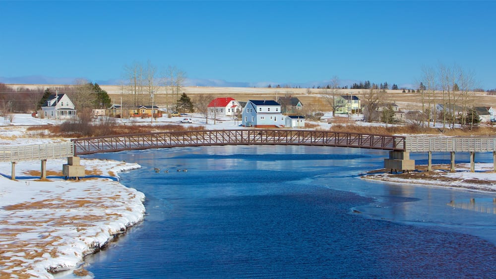 Prince Edward Island featuring snow, a bridge and a small town or village