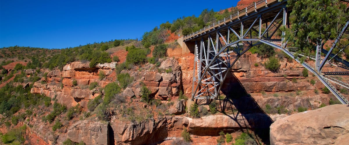 Oak Creek Canyon showing a gorge or canyon, a bridge and tranquil scenes