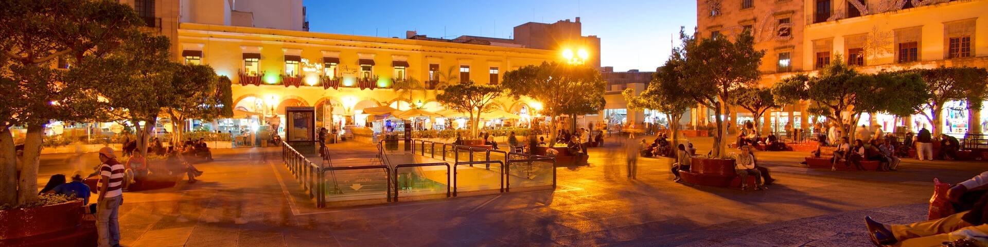 Mexico which includes night scenes and a square or plaza