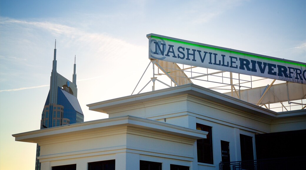 Cumberland Park featuring signage and a sunset