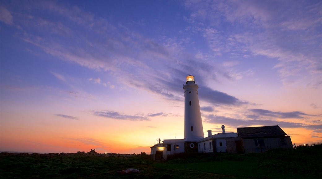 Seal Point Lighthouse which includes a lighthouse and a sunset