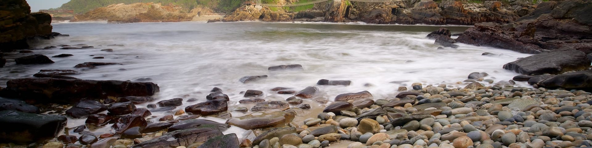 Tsitsikamma National Park showing a pebble beach and a river or creek