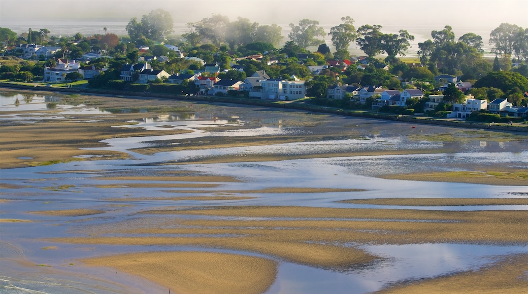 Knysna som visar en strand, en solnedgång och kustutsikter