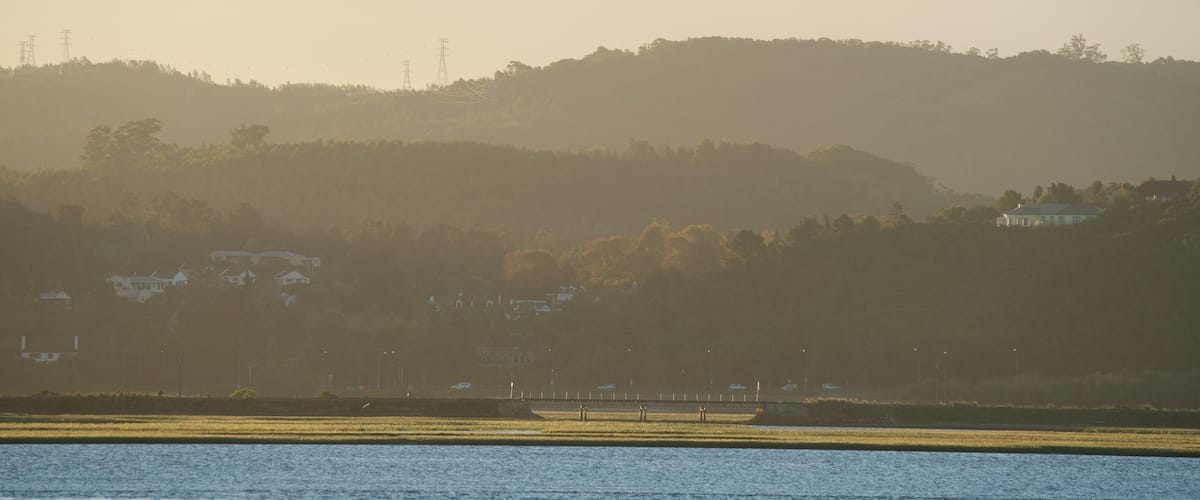 Knysna qui includes vues littorales, coucher de soleil et scènes tranquilles