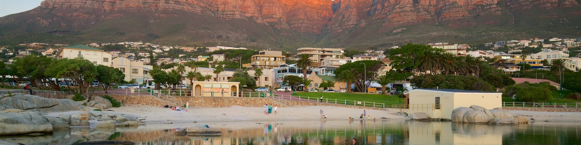 Camps Bay Beach showing a sandy beach and a coastal town