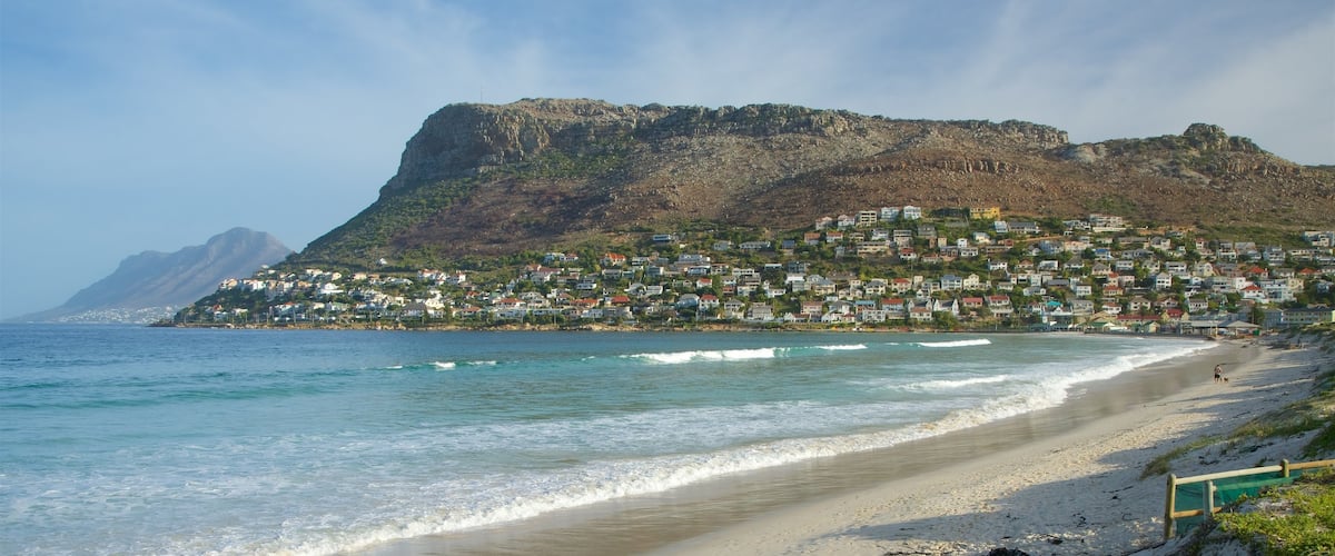 Fish Hoek Beach featuring a coastal town and a beach