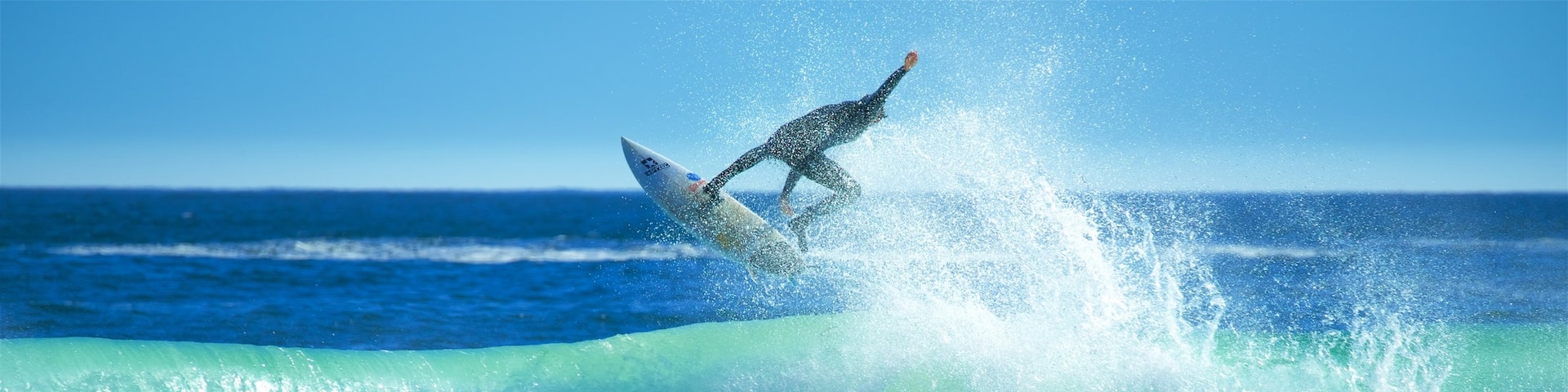 Llandudno Beach which includes waves and surfing