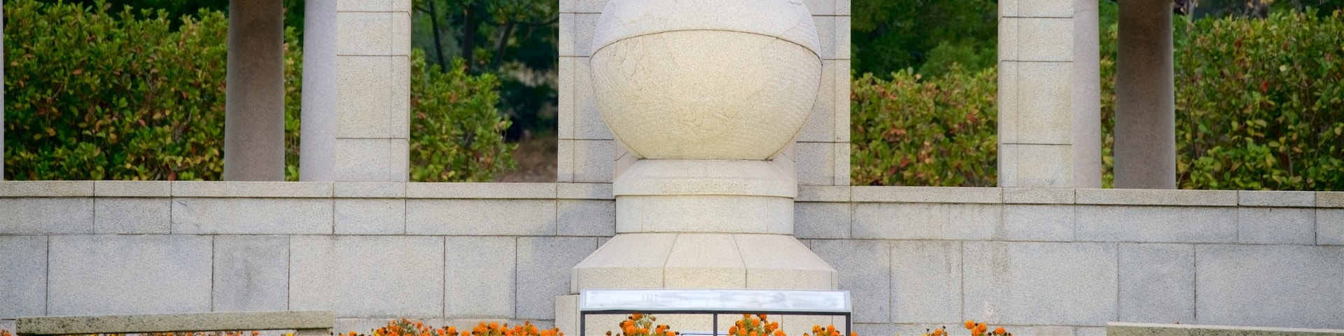 Huguenot Monument featuring a statue or sculpture, a garden and a monument