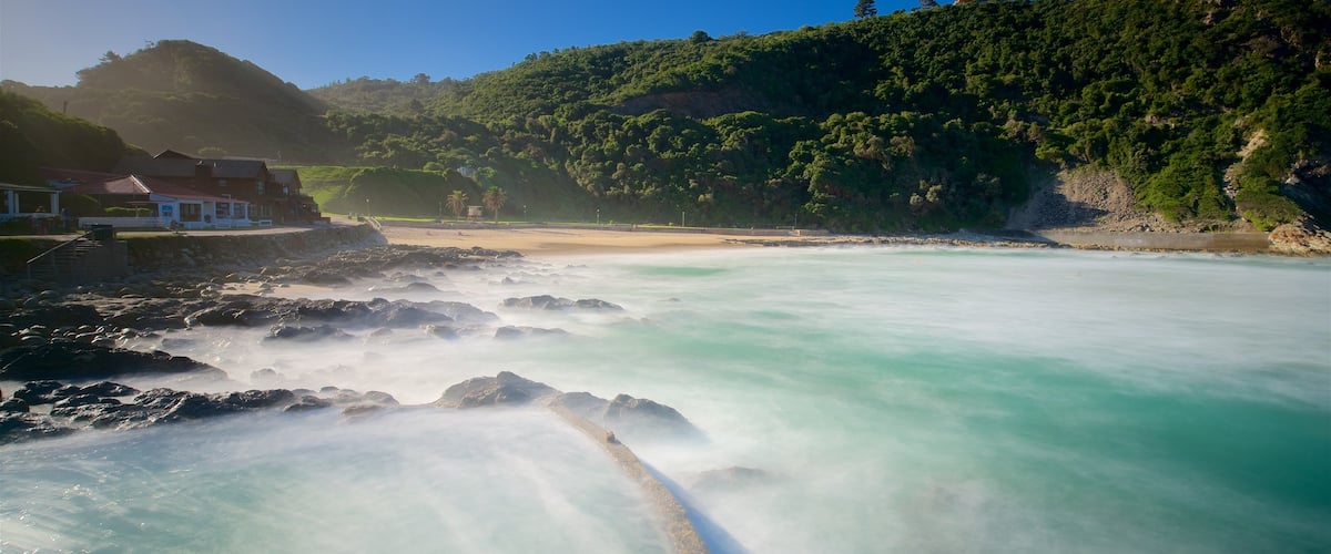 Victoria Bay Beach which includes a beach, rugged coastline and general coastal views