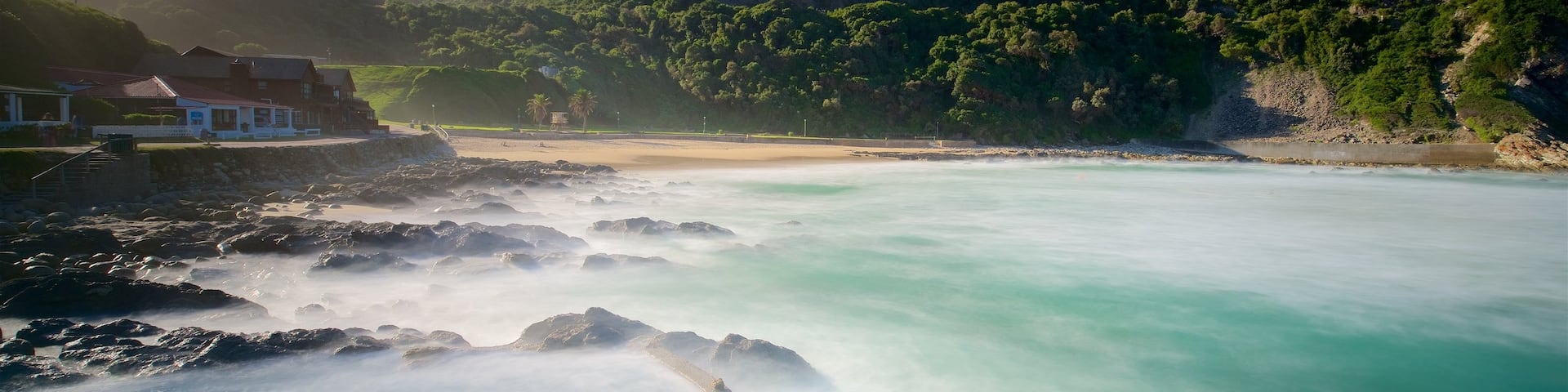 Victoria Bay Beach which includes a beach, rugged coastline and general coastal views