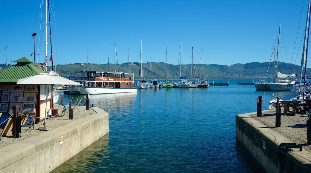 Knysna Quays which includes general coastal views, a bay or harbour and sailing