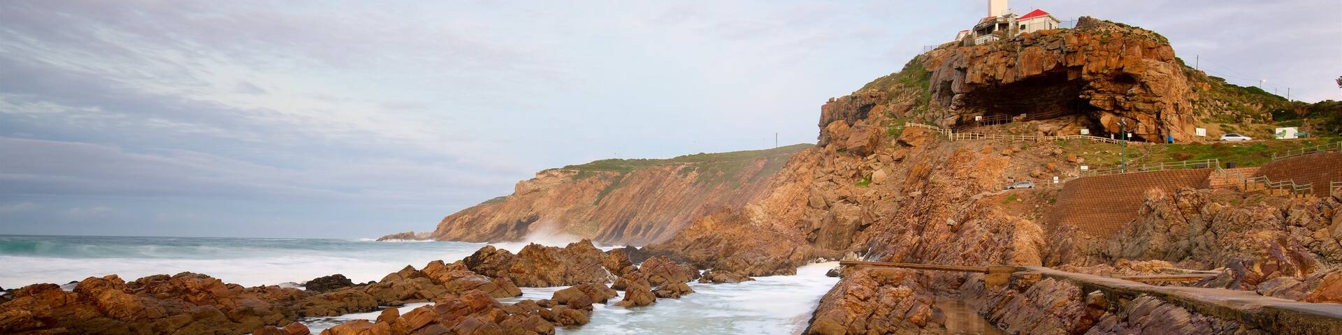 St. Blaize Lighthouse featuring a lighthouse, landscape views and rugged coastline