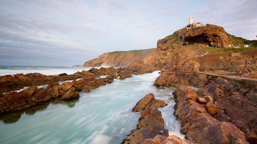 St. Blaize Lighthouse which includes a lighthouse, landscape views and rugged coastline
