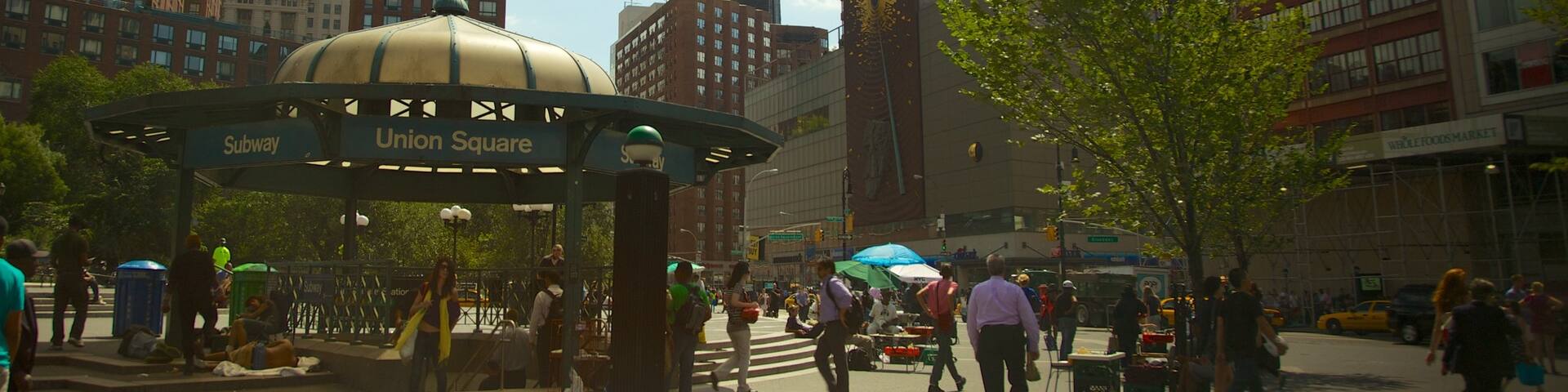 Union Square showing a skyscraper, a city and a square or plaza