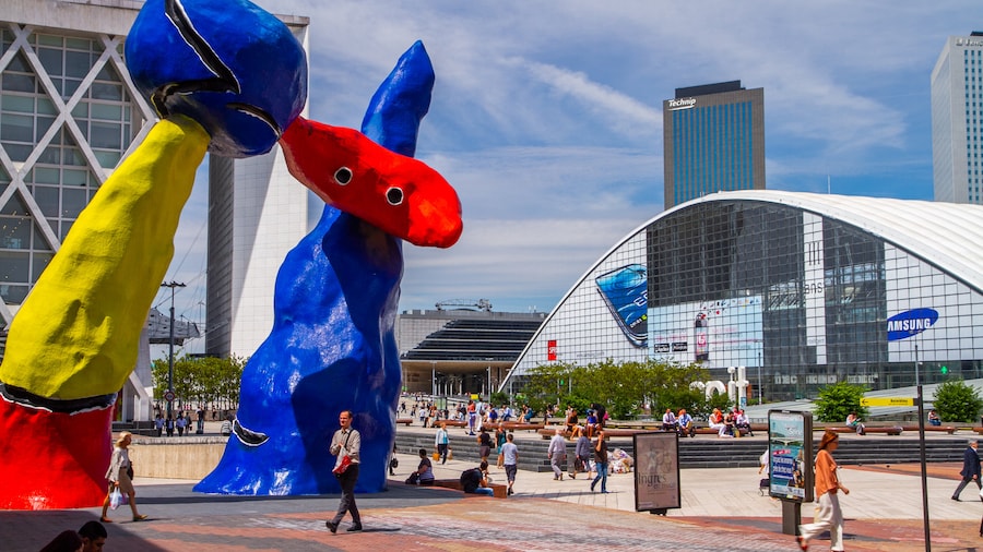 La Defense featuring a city, art and a skyscraper