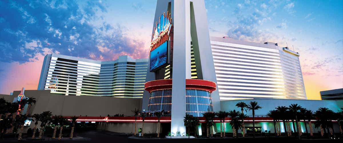 Stratosphere Tower stands tall in Las Vegas showcasing vibrant colors against a twilight sky