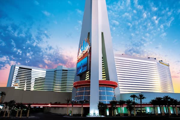 Stratosphere Tower showing a high-rise building, modern architecture and a sunset