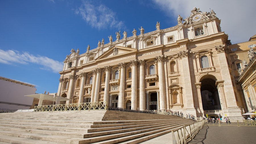 St. Peter\'s Basilica which includes a city, a square or plaza and a church or cathedral