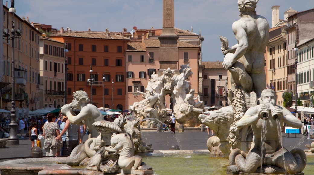 Piazza Navona showing a square or plaza, a fountain and a city