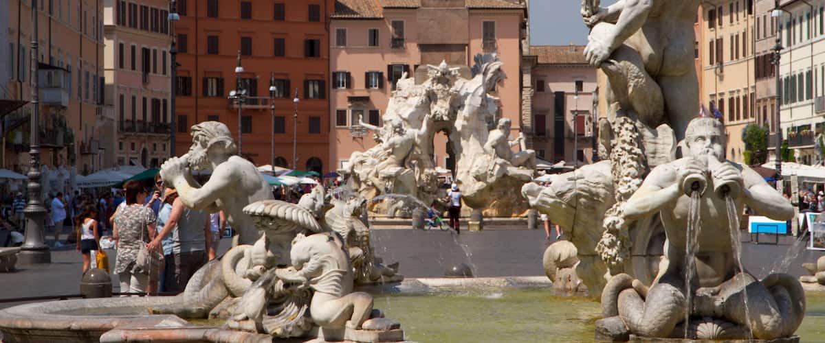 Piazza Navona showing a monument, art and a city