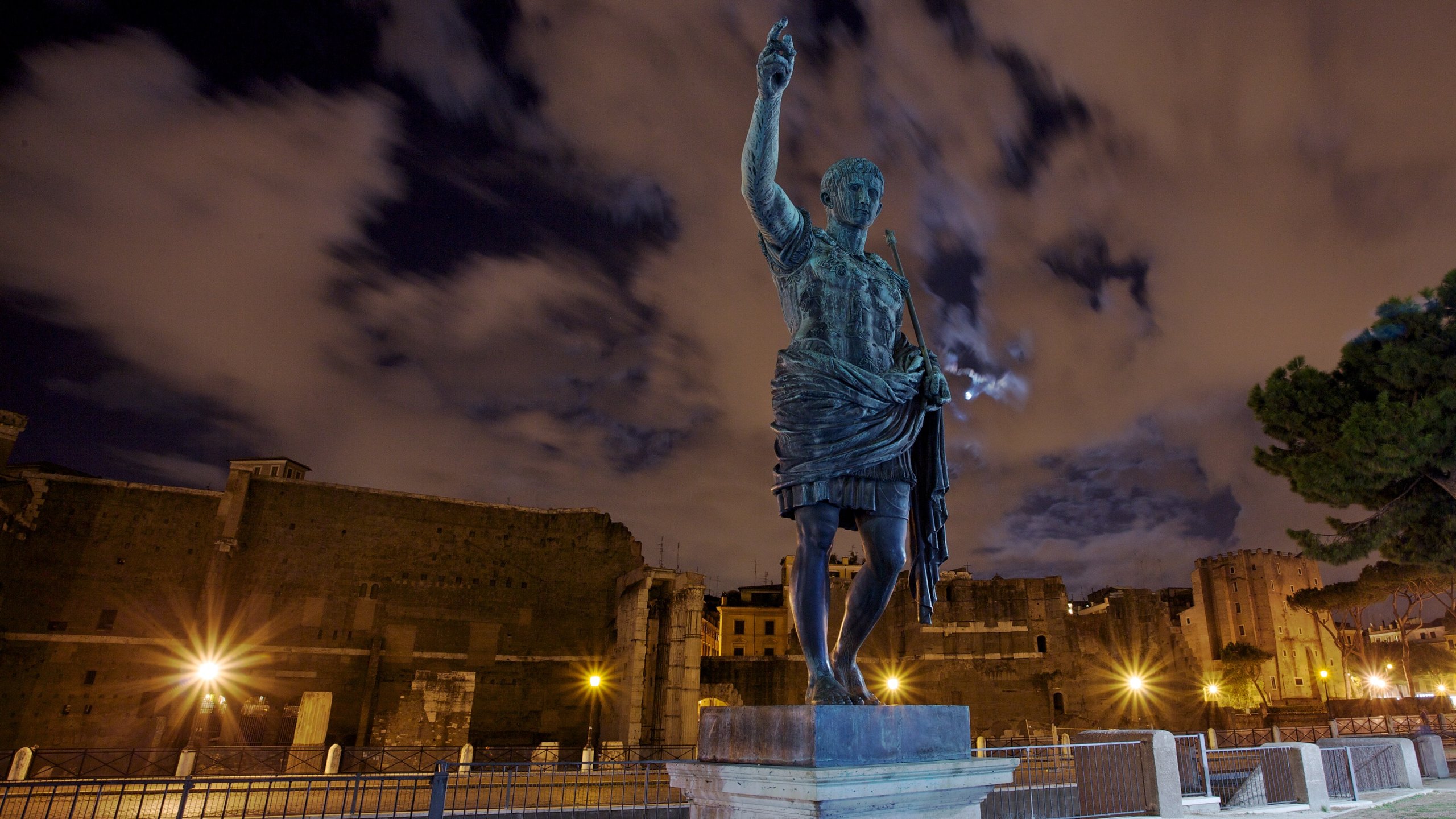 Rome which includes a statue or sculpture, a monument and night scenes