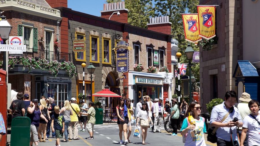 Universal Studios featuring a city and street scenes as well as a large group of people